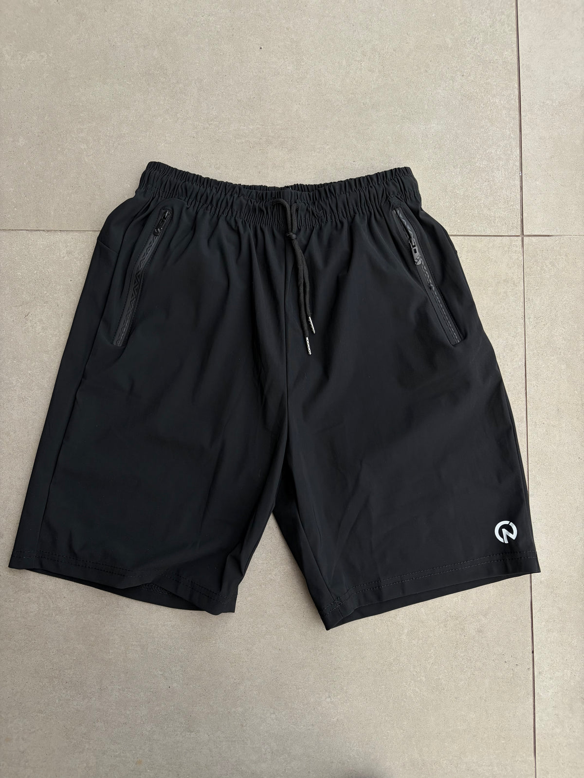 Shorts Ziper preto plissado - foto 9 de 12