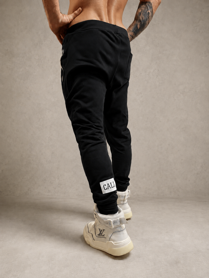 Calça Cali skinny preta com zíper branco - foto 11 de 13