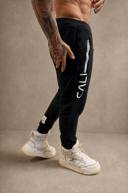 Calça Cali skinny preta com zíper branco - foto 9 de 13