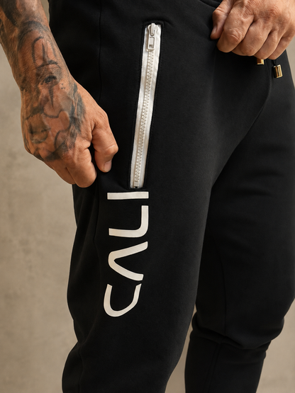 Calça Cali skinny preta com zíper branco - foto 5 de 13